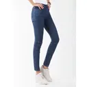 Джинсы для женщин Wrangler Blue Star.