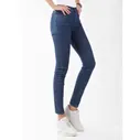 Джинсы для женщин Wrangler Blue Star.