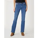 Джинсы клеш Wrangler
