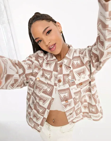 Wrangler all over monogram print co-ord denim jacket in brown-1