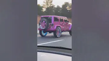 Pink Jeep Wrangler Highway Rollin on 32’s